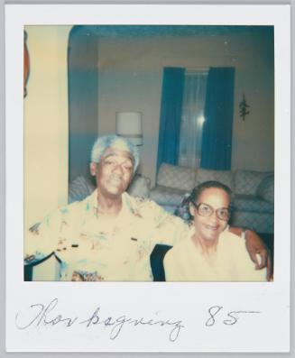 Thanksgivng 85 [Elderly couple smiling, man has arm around woman]