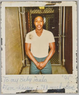 To my Baby Paula From Kassan with much love "94" [Young man in white t-shirt standing with hands together]