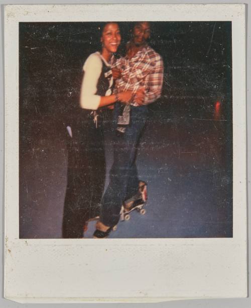 [Three adolescents in roller-skates posing]
