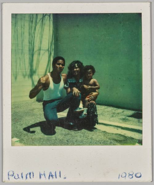 Paim Hall 1980 [Couple kneeling with little boy]
