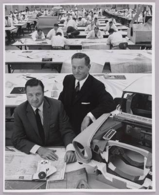 Henry Ford II and Ernest R. Breech in the Body Engineering Building at the Research and Engineering Center, Dearborn, Michigan 
