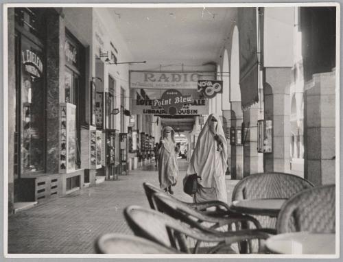New France in North Africa. Veiled women shopping in a big Alergian town.