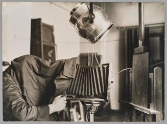 The photographer takes his picture