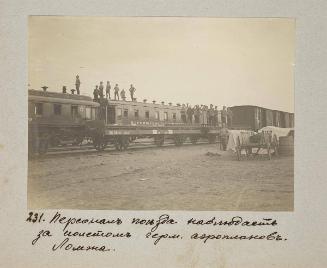 Train's personnel watching German airplanes flying. Lomzha.