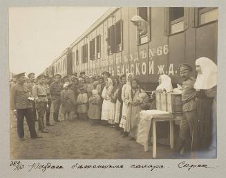Distributing of sugar to refugees. Luninets.