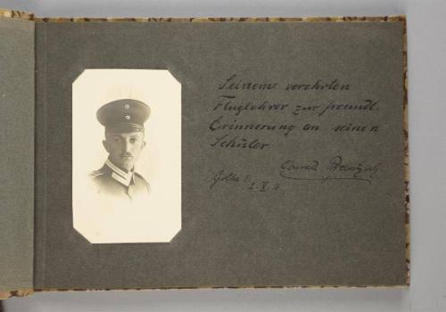 Page 1 of the presentation album, portraits of German pilots