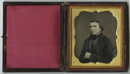 [Man with cravat and golden ring]