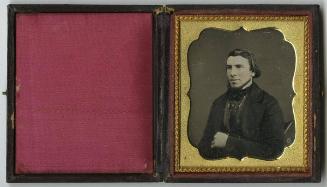 [Man with cravat and golden ring]