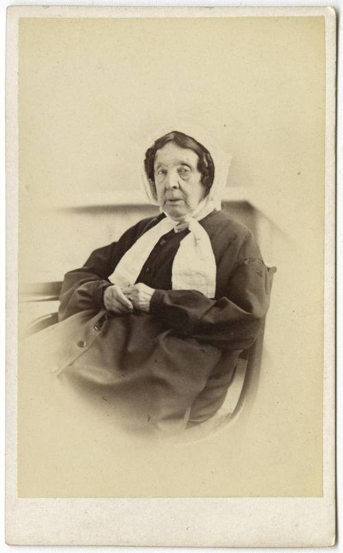 [Old woman with curls and bonnet]