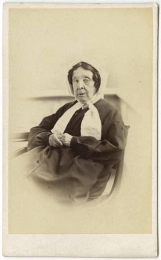 [Old woman with curls and bonnet]