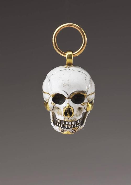 Skull Pendant with Entombed Skeleton