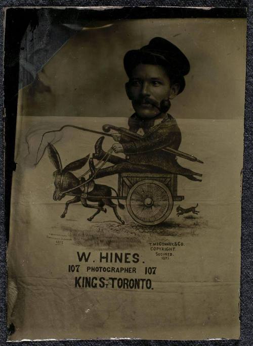 [Ad for W. Hines Photographer: Man with pipe in donkey-drawn cart]
