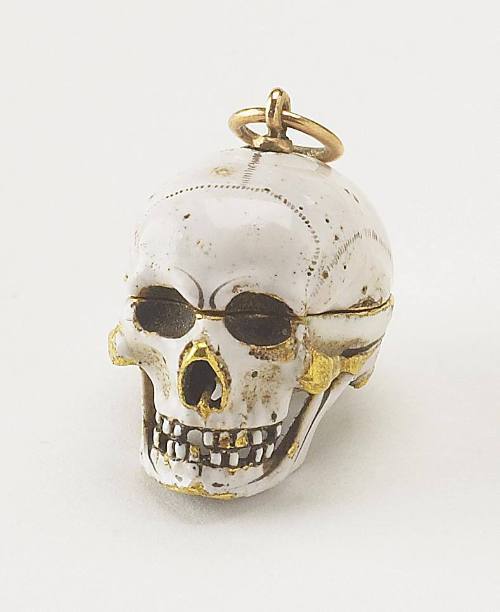 Skull Pendant with Entombed Skeleton