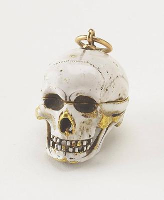 Skull Pendant with Entombed Skeleton