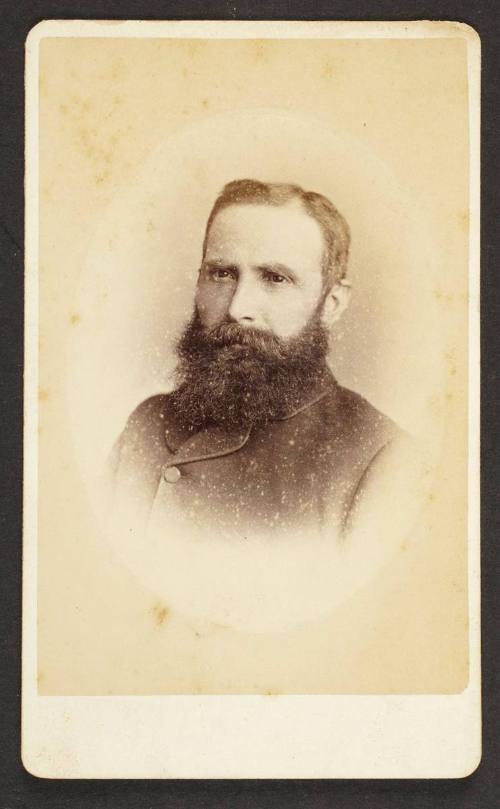 Unknown sitter [bust portrait of a man with a full beard, vignette]