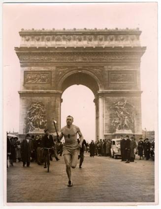 Runners Carry Symbolic Memorial Flame to Ends of France.