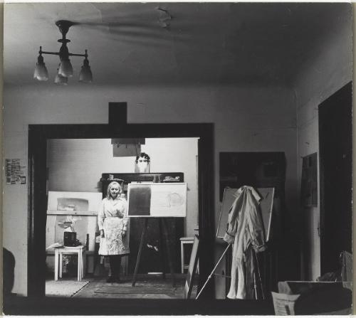 Joyce Wieland (standing in her studio)