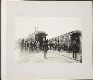 Whistlestop tour, two trains: Edith Audrey Beeton and others on train, crowd on tracks