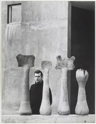 Arthur Handy (between sculptures)