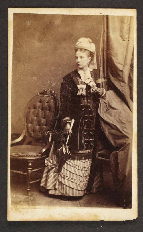 Unknown sitter [portrait of a standing woman with an umbrella]