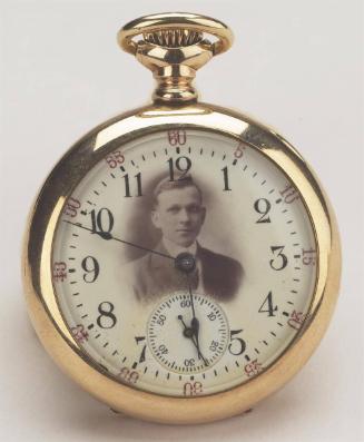 Pocket watch [Portrait of young man on clock face]