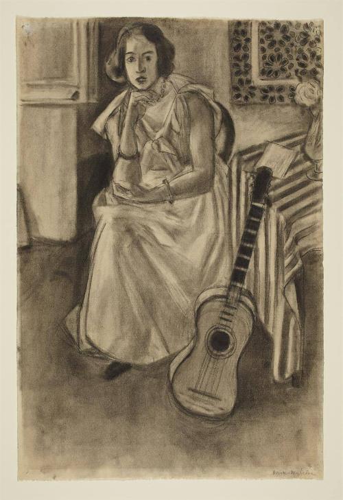 Seated Model with a Guitar