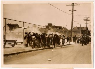 American Strikers Routed with Tear Gas.