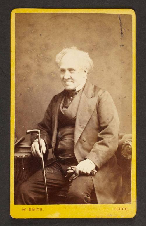 Unknown sitter [portrait of a seated elderly man with a walking stick and gloves]