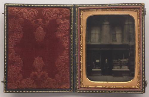 Hewitt storefront and shopkeeper