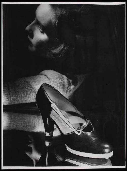 Shoe, model in background.