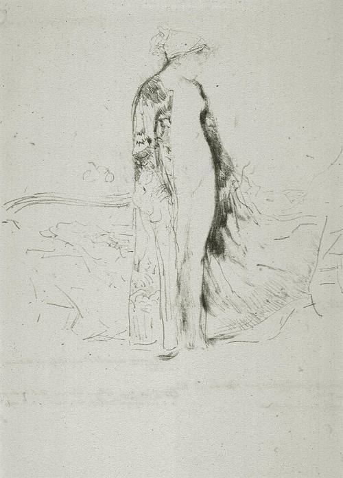 A Draped Model Standing Beside a Sofa