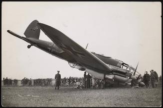 Nazi raider crippled by R.A.F fighters crashes. A Heinkel bomber crashes on the north-east coast.