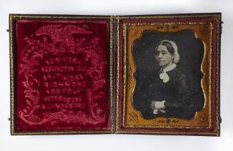 [Portrait of a lady wearing a veiled cap]