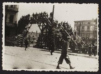 Lodz residents crossing the Zigerska Street bridge