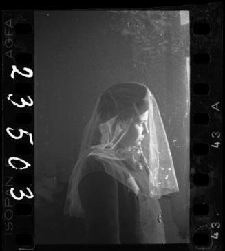 Portrait of a woman wearing a veil