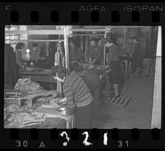 Women working in a workshop ("ressort") for textiles and garments in the ghetto