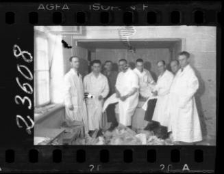 Hospital workers sorting provisions