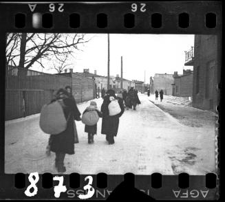 Deportation in winter, walking away