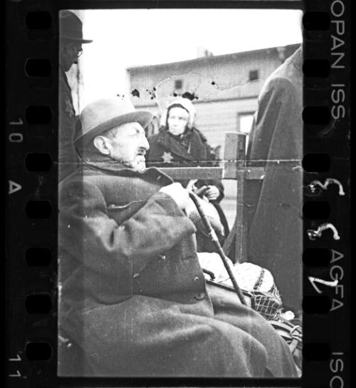 An elderly man with cane being deported to Chelmno nad Nerem death camp, Lodz Ghetto