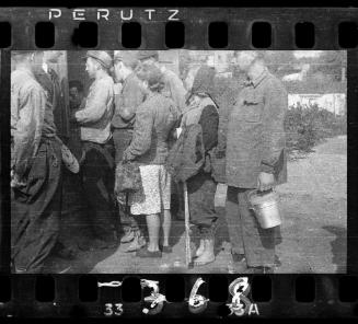 Line-up of residents outside of doorway