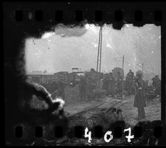 Jewish police officers oversee the delivery of goods to the ghetto