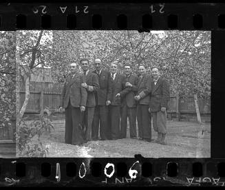 Male ghetto residnets in the garden