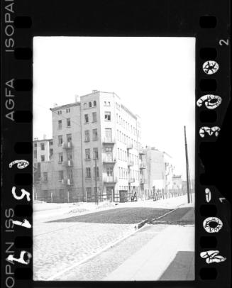 A six-storey corner building in the "Gypsy camp," the area designated for housing Roma deportees, surrounded by barbed wire fence