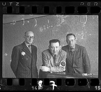 A Jewish policeman and two members of the Food Supply Department