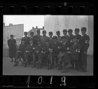 Group portrait of Jewish policemen in the ghetto