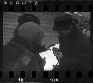 Residents making an exchange in the street