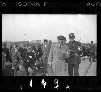 Ghetto police with deportation group