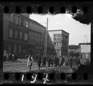 Residents gathered outside the hospital at 36 Lagiewnicka Street in the ghetto