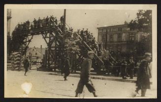 Lodz residents crossing the Zigerska Street bridge
