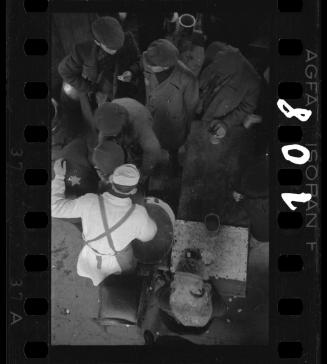 Man serving soup in the kitchen